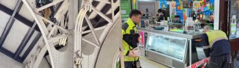 Los bomberos acordonan un pasillo del Mercado Central ante la caída de cascotes del techo