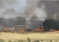 Un incendio forestal en Moixent moviliza medios aéreos y terrestres y obliga a cortar la carretera CV-589